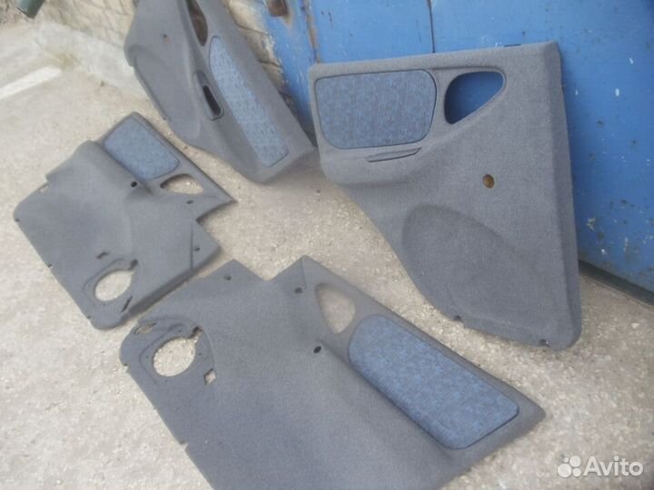 Нива шевроле обшивки дверей