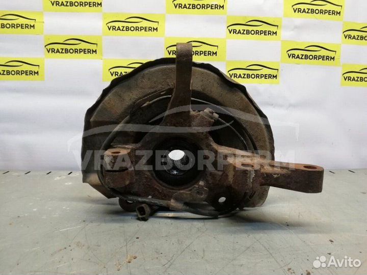 Кулак поворотный передний левый Mitsubishi Lancer