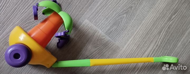 Игрушка каталка с ручкой