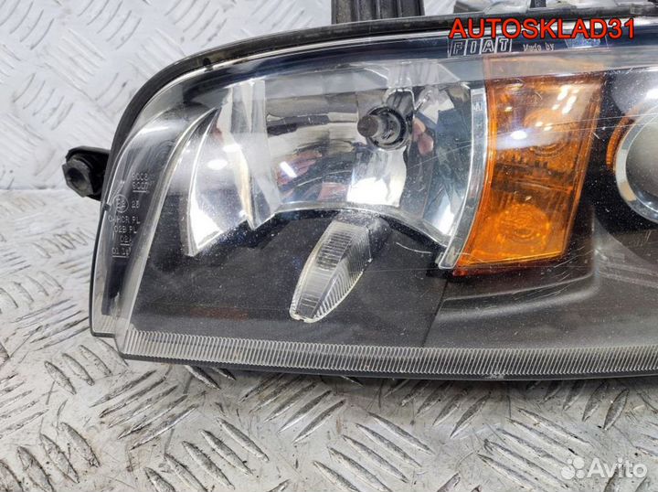 Фара левая Fiat Punto 2 89100449