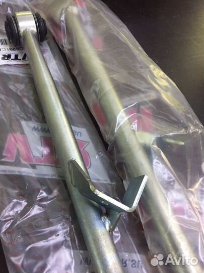 Поперечный рычаг задней подвески, нижний, левый о