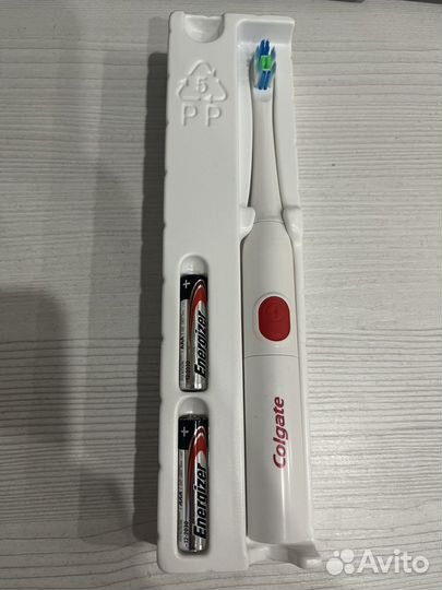 Электрическая зубная щетка colgate