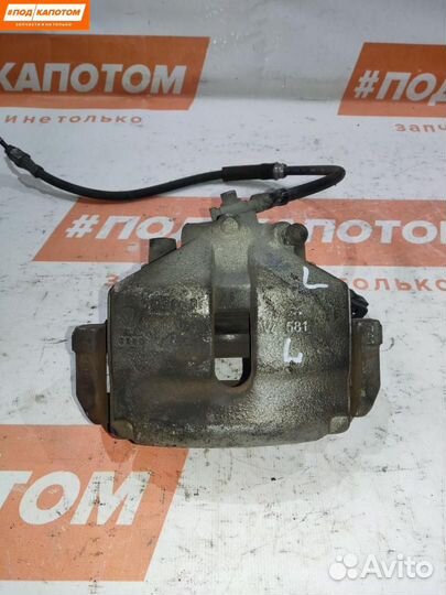 Суппорт тормозной передний левый Volkswagen Golf 5