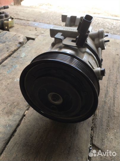 Компрессор кондиционера 97701A5502