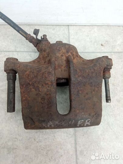 Суппорт тормозной передний правый Renault Kangoo 1