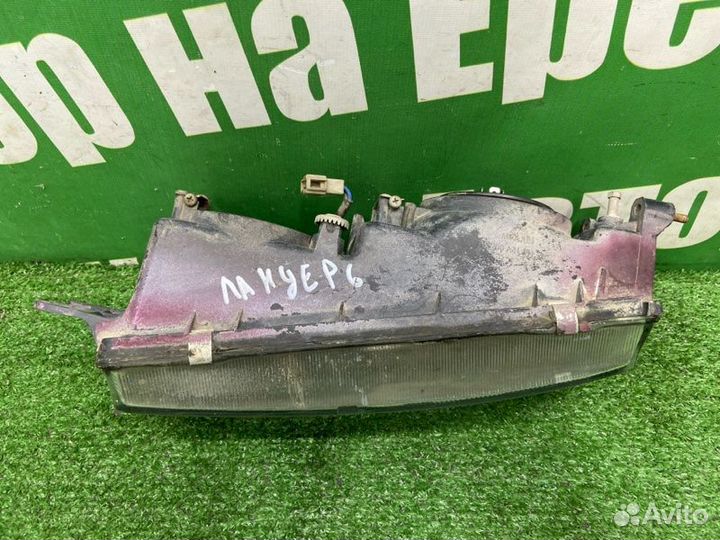 Фара галогеновая передняя левая Mitsubishi Lancer