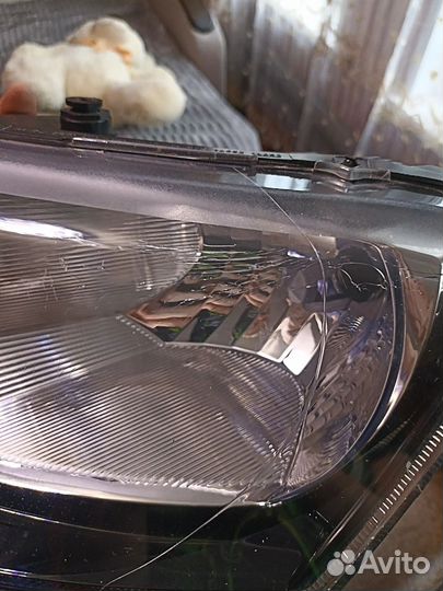 Фара skoda rapid 2014