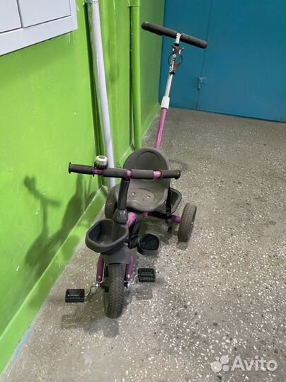 Трехколесный велосипед с ручкой