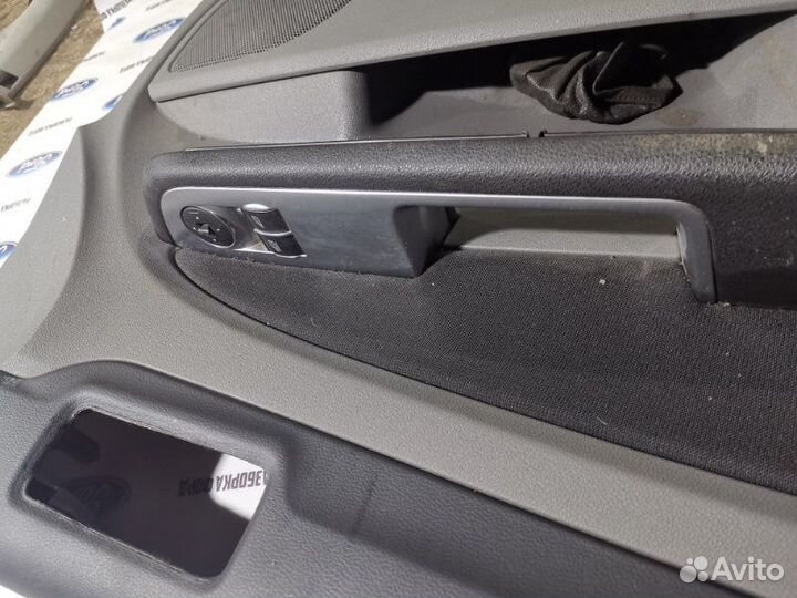 Обшивка боковой двери передняя левая Ford 2.0-2.3