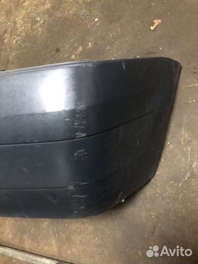 Задний бампер с дефектом на renault logan 1 2008г