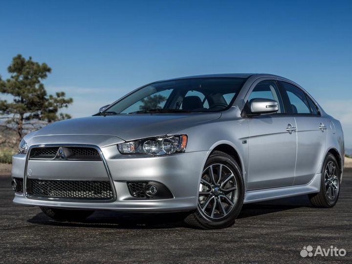 Амортизатор (стойка) задний Mitsubishi Lancer X