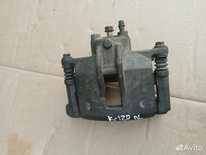 Суппорт тормозн перед левый Corolla E12 2001-2007