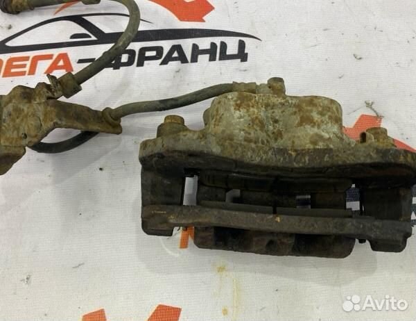 Суппорт тормозной передний левый Peugeot 4007