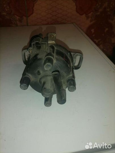 Трамблер Daihatsu Pyzar 1910087119 G303G HE-EG