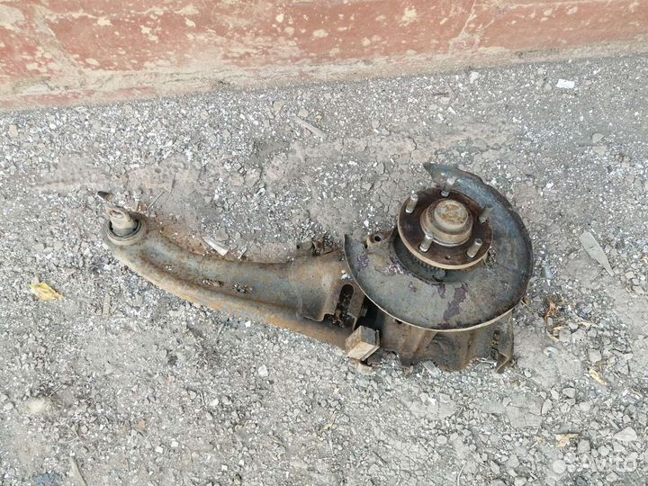 Задний рычаг продольный левый Mazda 6 GG