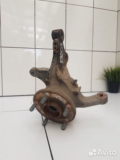 Кулак поворотный передний левый (Geely Atlas)