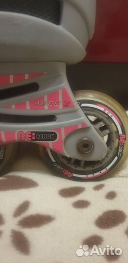 Роликовые коньки