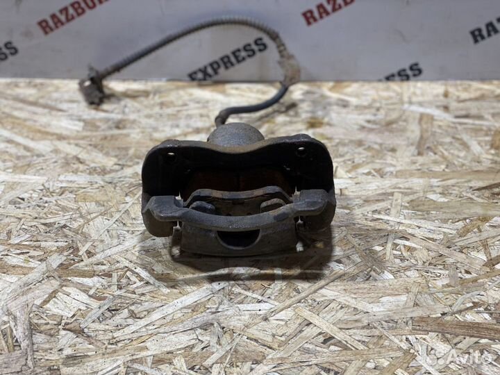 Суппорт тормозной передний левый Hyundai Solaris 1