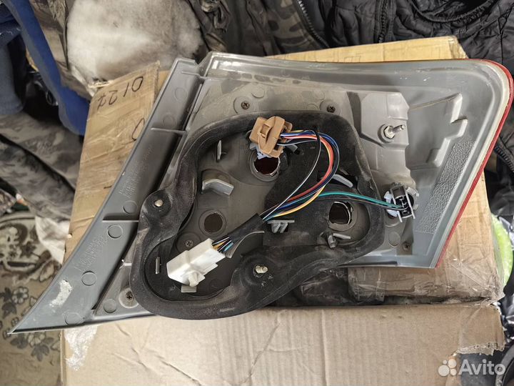 Фара Тойота аксио левая задняя