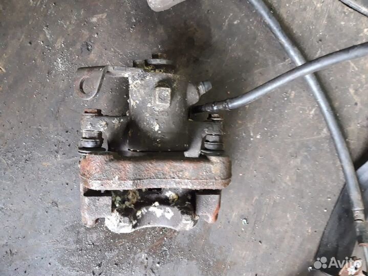 Суппорт задний тормозной Volkswagen Polo Skoda Rap