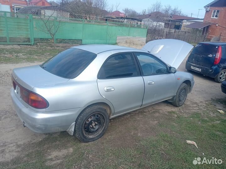 Mazda familia разбор