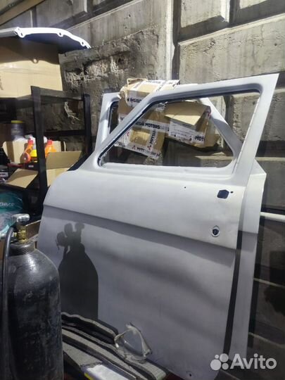 Двери передние газ-21