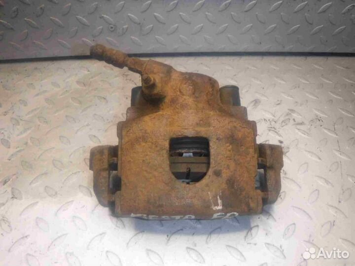 Суппорт тормозной передний правый Ford Fiesta