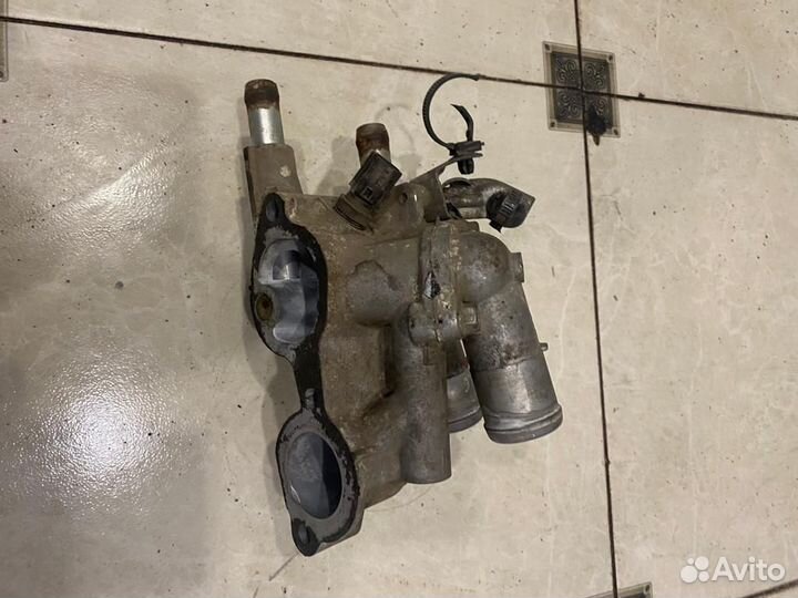 Корпус термостата Mitsubishi Lancer 10