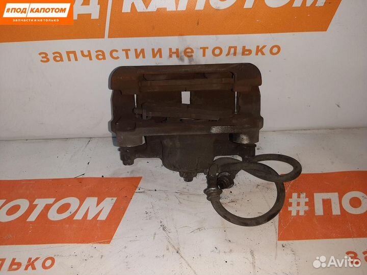 Суппорт тормозной передний левый Nissan X-Trail