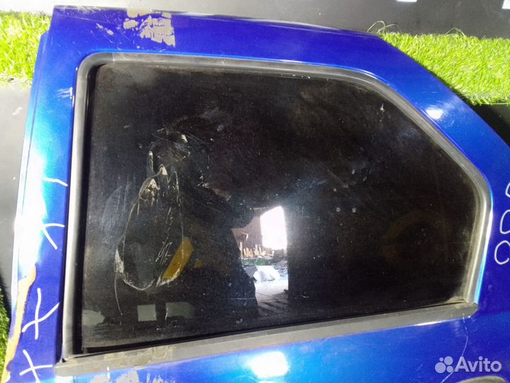 Стекло двери задней левой Renault Logan