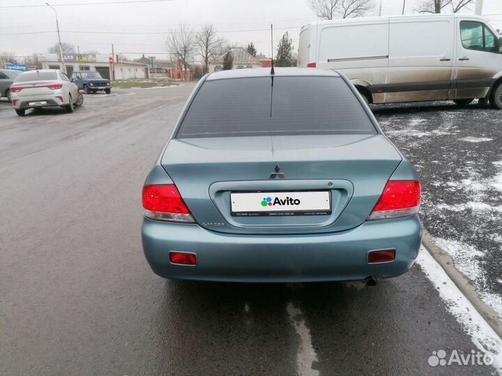 Mitsubishi Lancer 1.6 МТ, 2006, 140 000 км