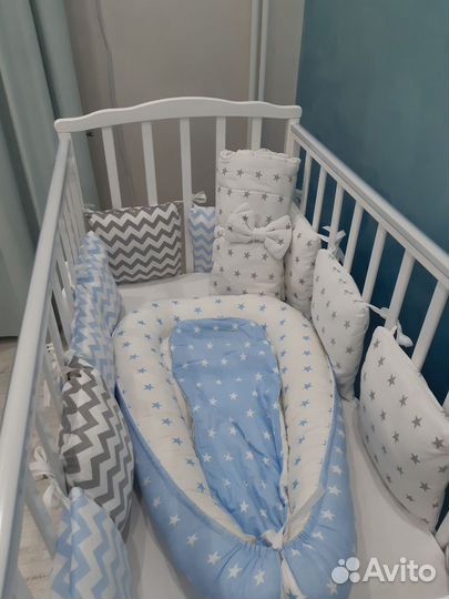 Детская кроватка с маятником