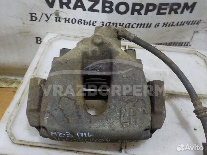 Суппорт тормозной передний левый Mazda 3