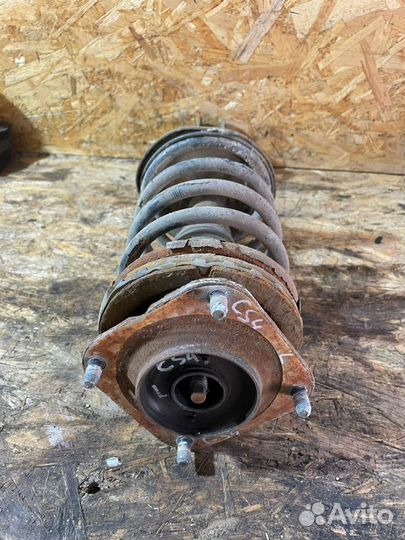 Стойка передняя левая Киа Спектра