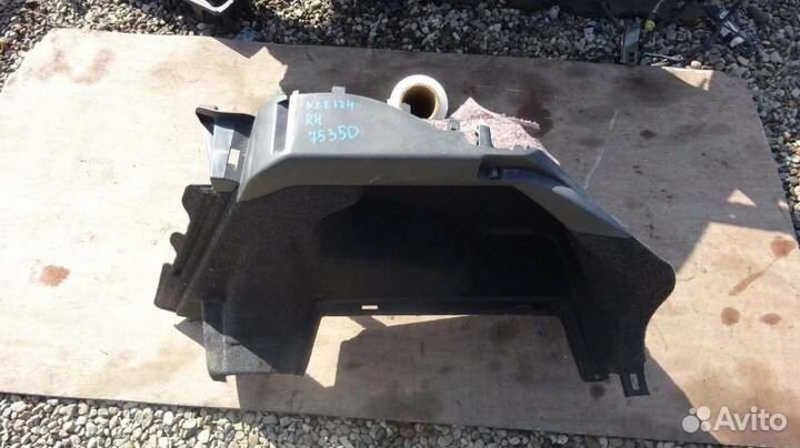 Обшивка багажника левая Toyota Allex NZE124 1NZ-FE