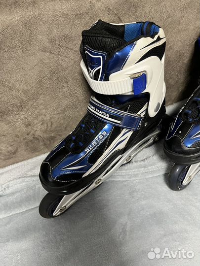 Роликовые коньки