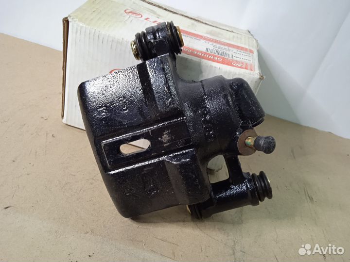 Суппорт тормозной передний левый Lifan Smily