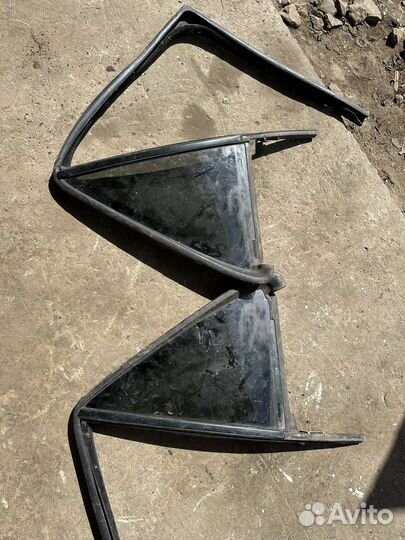 Cadillac srx стекло задней двери