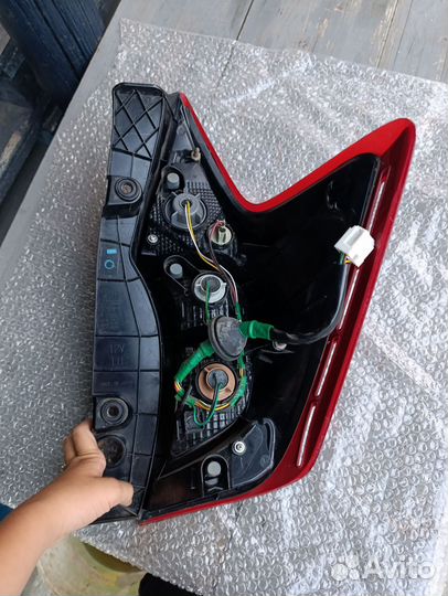 Задний фонарь Nissan note E 12 левый