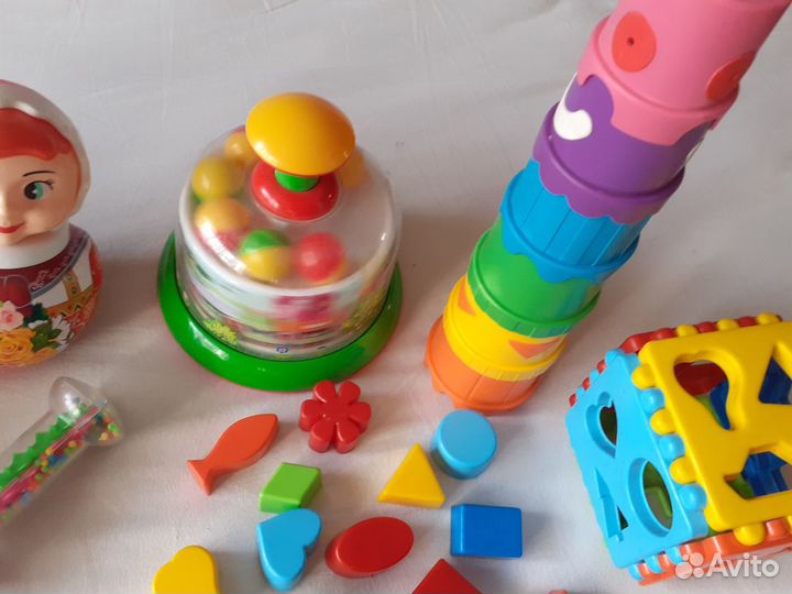 Развивающие игрушки, погремушки, юла