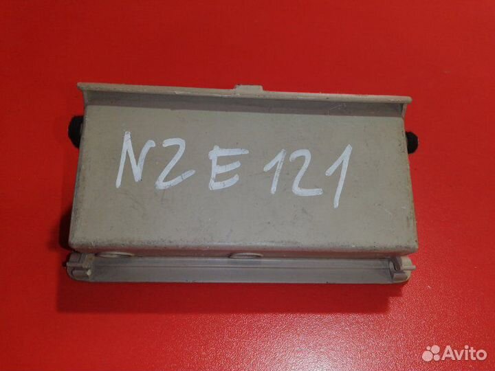 Бардачок водителя Toyota Corolla Fielder NZE121
