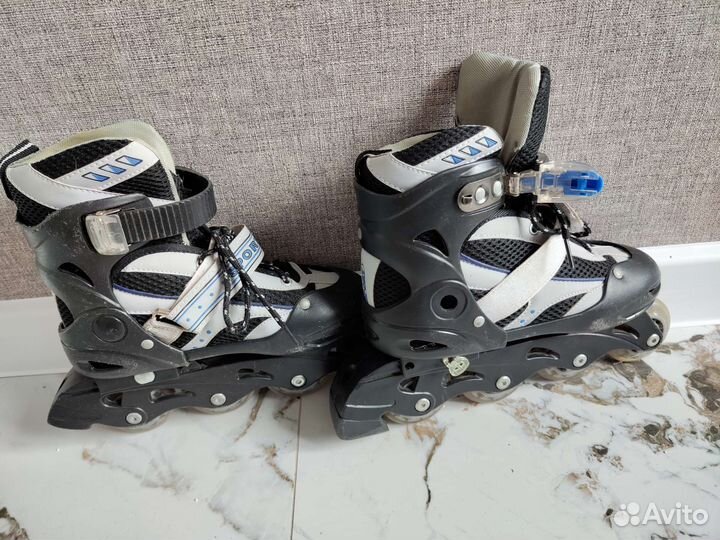 Роликовые коньки