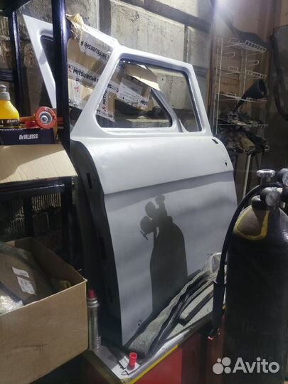 Двери передние газ-21