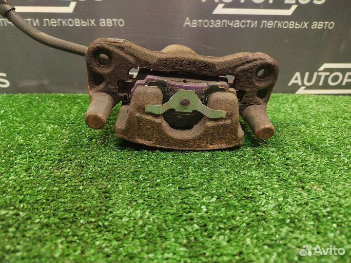 Суппорт задний правый Mitsubishi Lancer X седан