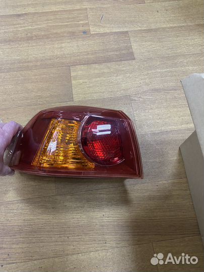 Фонарь задний левый mitsubishi lancer 10