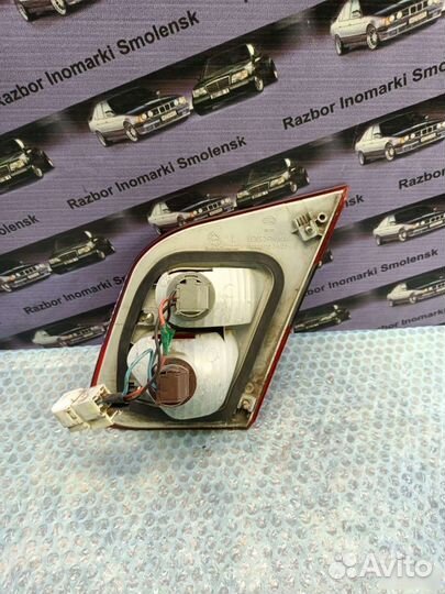 Фонарь задний левый Mitsubishi Carisma