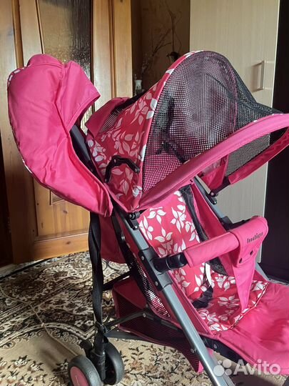Прогулочная коляска розовая
