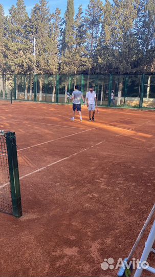 Тренер по большому теннису