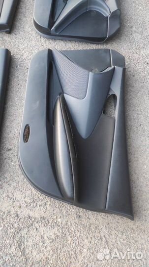 Обшивка боковой двери Nissan Primera P 12