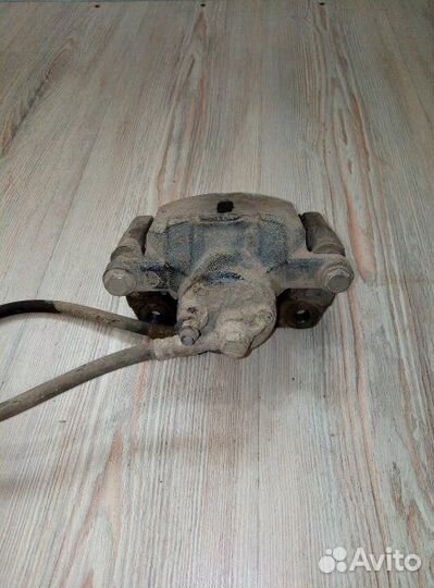 Суппорт тормозной перед Geely MK Лев